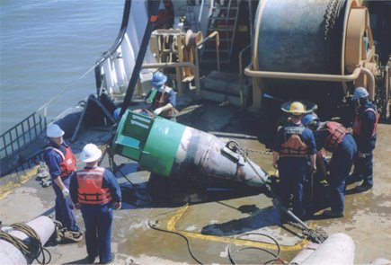 US Coast Guard Ship Repairing Buoy