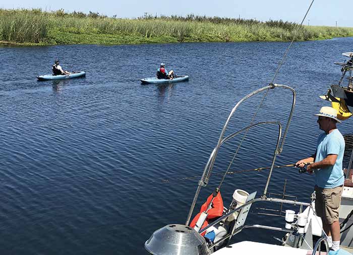 The Mighetto brothers kayak Owl Harbor