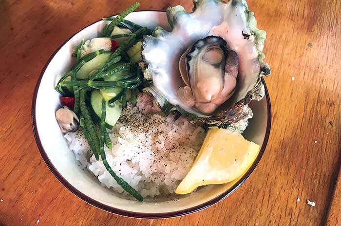 Meal of foraged oysters, mussels, and sea beans